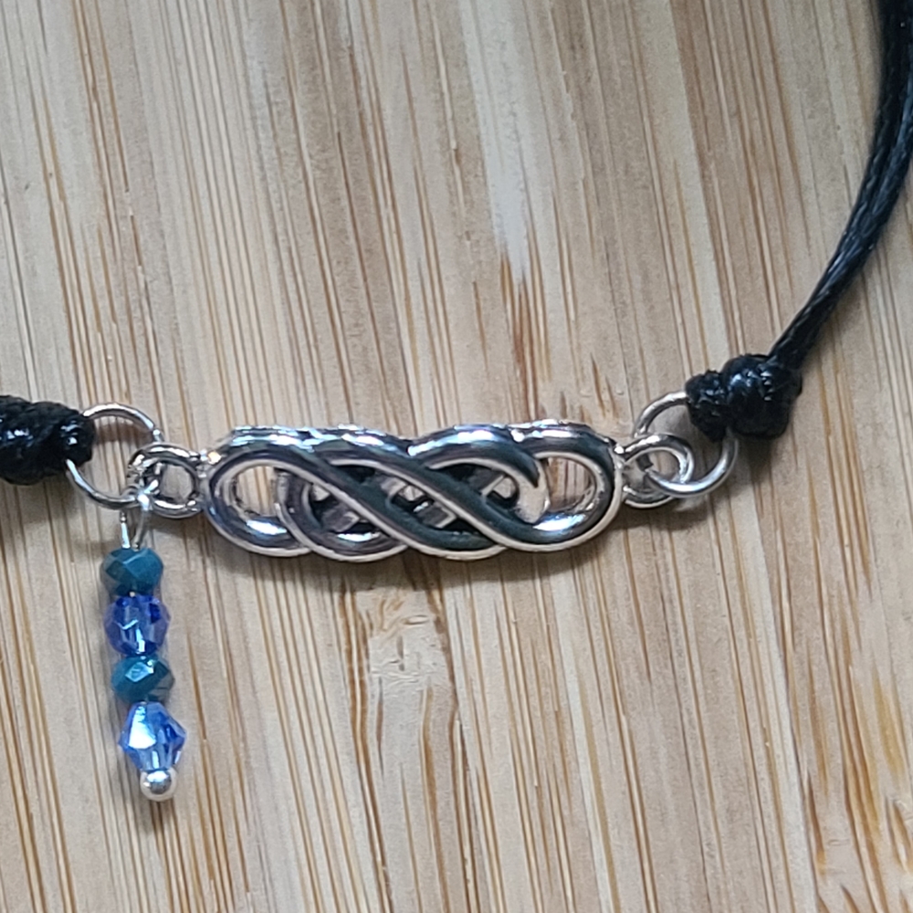 Elegant Silver and Blue Braided Bracelet